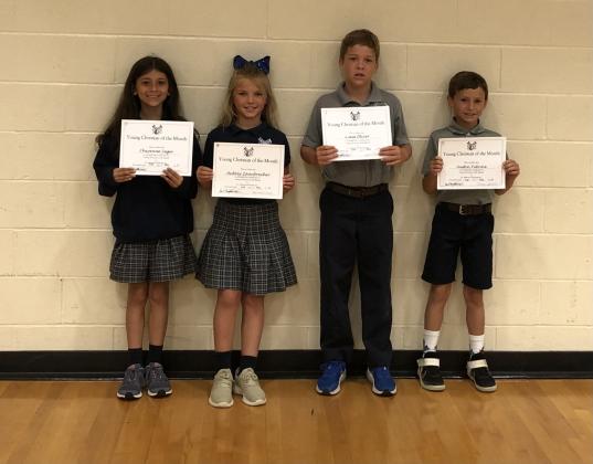 St. Edmund Elementary held its Awards Day ceremony recently. Many students were honored and recognized. The Young Christian Award went to Cheyenne Leger, left, Aubrey Zaunbrecher, Liam Oliver and Austin Vidrine.