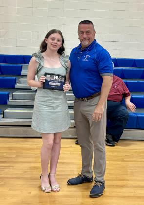 The Woodman of the World Award went to Georgia Kate Wimberly. She is pictured with her principal Mitch Fontenot.