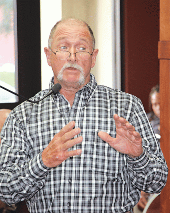 Frank “Buddy” Helton Jr., chairman of the Central St. Landry Economic Development District, speak at the June 5 Parish Council meeting. (Photo by Harlan Kirgan)