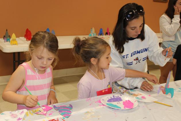 A Stellar of a time was happening at Happy Days (Vacation Bible School) at St. Anthony Catholic Church’s social hall. The theme of the summer Vacation Bible School was “Stellar Shine Jesus’ Light.” Painting a rocket ship are, from left, Olivia Guillory, Haley LaFleur and Elizabeth LaFleur.
