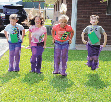 And they are off to the finish line at Happy Days Vacation Bible School at St. Anthony’s Church. The Jeanmard Center was the place to be for children kindergarten through fifth-grade ages. The theme of the Happy Days was, “Stellar Shine Jesus’ Light.” Enjoying a sack race, from left, are Gus Thibodeaux, Raphaela High, Rose Cleland and Jack Turner. (Photo by Myra Miller)