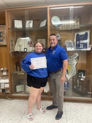 Emma-Kate Reed, a seventh grader at St. Edmund, earned a perfect attendance certificate at the end of the school term awards program.