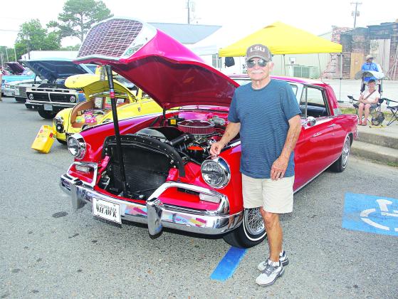 Phillip Fife, of Walker, with is 1962 Studebaker Hawk on Walnut Avenue.