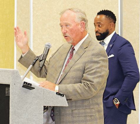 Competing lawyers, from left, Robert Hammonds and Courtney Joiner at Monday’s special School Board meeting. (Photo by Harlan Kirgan)