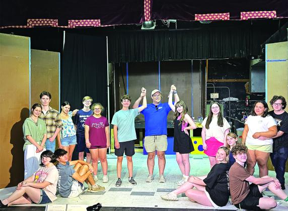 The Eunice Players Theater will stage “Grease” in July at its South 2nd Street theater. Seated, from left, are Amelia Bourgeois as Marty, Leo Spell as Sonny, Josephine Ohlenforst as Frenchie, and Phillip Cormier as Doody. Standing, from left, are Rose Young as Jan, Joe Aucoin as Roger, Laylah Glland as Patty Simcox, Daxton Broussard as Danny Zuko, Gabe Ortego, Eunice Players Theater president, Liana Reed as Sandy Dombrowski, Amelie Fontenot - Ensemble, Deshae Davis as Betty Rizzo and Hewson Bourgeois as Ken