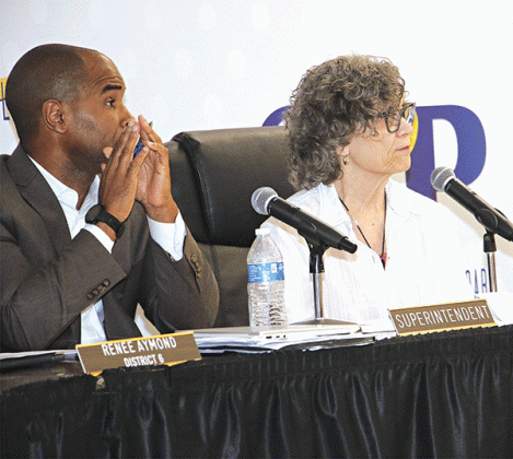 St. Landry Parish School Superintendent Milton Batiste III, left, and School Board President Mary Ellen Donatto at Thursday’s Board meeting. (Photo by Harlan Kirgan)