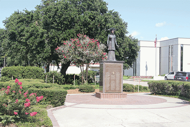 The Eunice Rotary Club is celebrating its 100th year with a project focused on the Eunice Pharr Duson statue at 2nd Street and Park Avenue. (Photo by Harlan Kirgan)