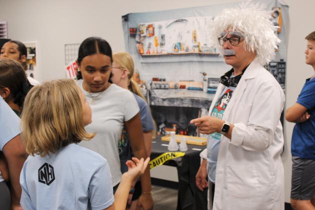 At the science station of Summer Surge (Vacation Bible School) at New Hope Church was Dr. Stellarios (Tammy Stelly). Children ages, 5-12, attended the Summer Surge this week.