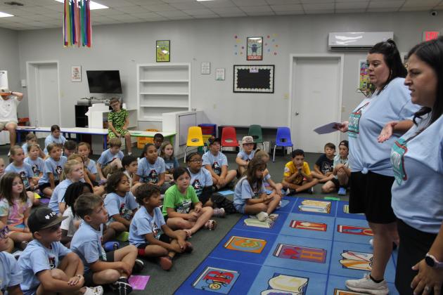 Above are 8 and 9-year-old kids learning a Bible lesson at New Hope Church’s Summer Surge camp held this week. Leaders, above, from left are Katie Richard and Margaret Gil. Other volunteer leaders were Jennifer Fontenot and Braylen Boutin.