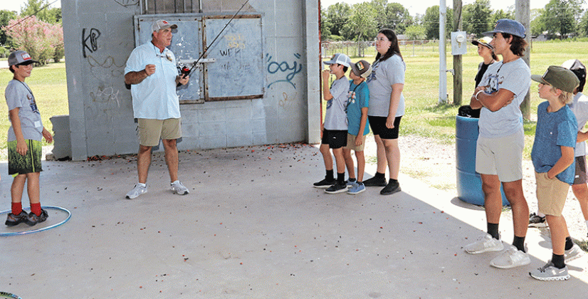 Below, volunteer instructor Robert Gaspard talks about how to use a fishing rod. Instructors also come from the St. Landry Parish Sheriff’s Office and Louisiana Wildlife and Fisheries.