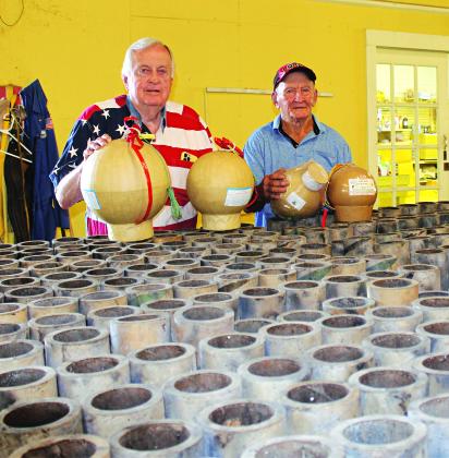 The show will go on rain or shine... Peart says it has to be raining at 9 p.m. Friday for the fireworks show to be cancelled. Kenneth Peart, left, and Shorty Rougeau, a volunteer helper were preparing for the annual 4th of July event last week. (Photos by Myra Miller)