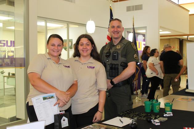 The LSUE Office of Veteran Affairs held a Vet Fest from 9 a.m. to 11 a.m. Tuesday at the Dr. Anthony Mumphrey Center on LSUE campus. From left are Neesi Crochet, Torie Aucoin and Stephen Guidry, with the Lafayette Sheriff Office. Crochet and Aucoin are LSUE Facility Service employees.