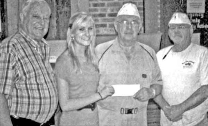 VFW Post 8971 presents scholarships. Cesly West, a senior from Eunice High, received a $1,000 scholarship from the Eunice Veterans of Foreign Wars Post 8971. From left are Louis Pavur, post adjutant; West, Post Commander Al Courville, and Post Quartermaster Hilton Lavergne.