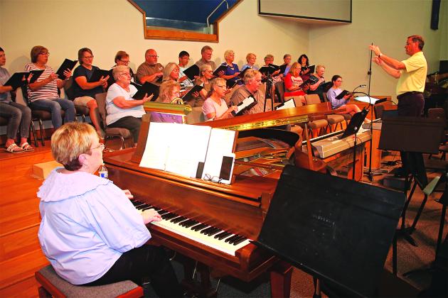 The Eunice Community Concert Band &amp; Choir will stage its summer concerts at 7 p.m. Thursday and Friday at the First Baptist Church in Eunice. The choir is shown practicing at the church on Tuesday. Tickets are $5 for adults and $2 for children under 12. Tickets can be purchased by calling 337-457-1776 or can be purchased at the door. (Photo by Harlan Kirgan)