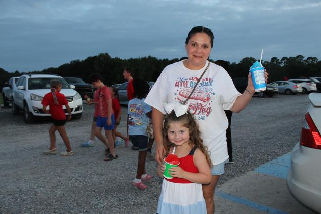 Snow cones were on sale at the 4th of July fireworks display at the Recreational Complex and enjoying one are Josette Fruge and Danika Fruge.