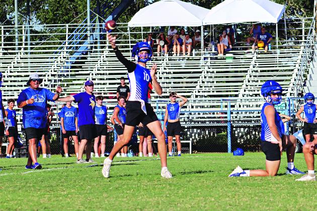 The Blue Jays’ Nathan Zaunbrecher launches the ball during the 7-on-7 contest with Opelousas Catholic.