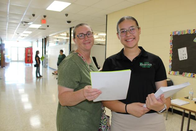 Mother and daughter together at Eunice High’s registration. From left are Misty Jones, left, and her daughter Dahlia Jones, a senior.