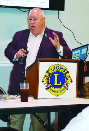 Louisiana Commissioner of Agriculture Dr. Mike Strain speaks to members of the Crowley Lions Club recently about the importance of agriculture in Acadia Parish, across the state and around the world. (Photo by Steve Bandy, The Post-Signal)