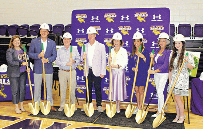 Handling the ceremonial shovels, from left, are Carey Lawson, LSU Eunice Foundation executive director; Kip Bertrand, LSU Eunice Foundation president; Patrick Morrow, LSU Board of Supervisors vice chair; Jeff Willis, LSU Eunice athletic director; Dr. Nancee Sorenson, LSU Eunice chancellor; Rebecca Boniol, LSU Board of Supervisors member; Esperanza Moran, LSU Board of Supervisors member; Emily Otken, LSU Board of Supervisors student member.