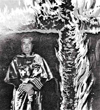 Robert Fuller in Klan regalia. (From “Ten Years of Leadership in the Original Ku Klux Klan of America, Inc.,” a book published in 1972 by Robert Fuller and Jack Barnes)