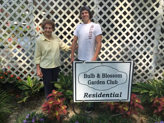 The Eunice Bulb &amp; Blossom Garden Club presented the Residential Garden of the Month marker to Helen Bellard and Aiden Bellard at 1300 Nile Street. The lawn features flowering landscaped beds of agapanthus, coleus, impatiens, New Guinea, Sweet potato, crape myrtles and much more. (Submitted photos)