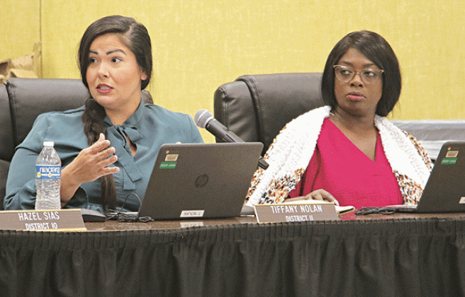 St. Landry Parish School Board members, from left, Tiffany Nolan and Timmakah Hardy at Thursday’s Board meeting in Opelousas. Nolan was commenting on a proposed school study by demographer Mike Hefner. (Photo by Harlan Kirgan)