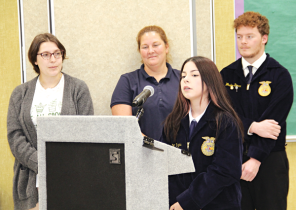 Eunice High School FFA students, Jasmine Vargas and Wesley Doucet were state winners and advance to compete on the national level.  Vargas and Doucet were introduced at the St. Landry Parish School Board meeting on Thursday. At the meeting, from left, are agricultural teachers Brook Comeaux and Rebecca Berzas, and Vargas and Doucet. (Photo by Harlan Kirgan)