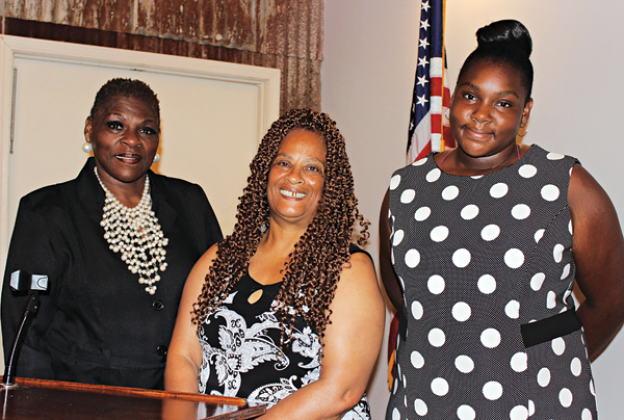 Bobbie Brown, founder of Sister2Sisters, was the guest speaker at Eunice Rotary Club Wednesday. She invited her daughter and friends to the meeting. From left are Brown, Priscilla Simon, and Shakaria Brown, Brown’s daughter. (Photo by Myra Miller)