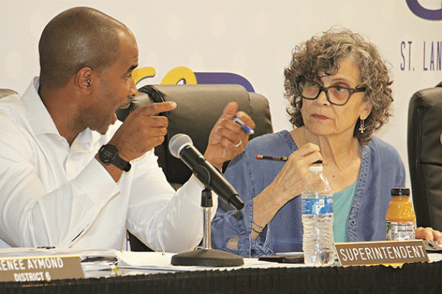 From left, St. Landry Parish School Superintendent Milton Batiste III and School Board President Mary Ellen Donatto discussed budget issues at Thursday’s School Board meeting. (Photo by Harlan Kirgan)