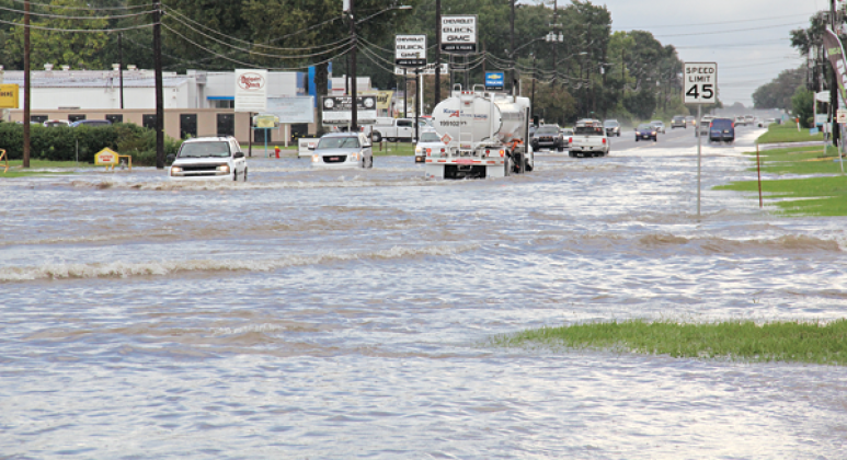Flooding rains occurred at about 5 p.m. Tuesday in Eunice. U.S. 190 is shown flooded by the Amy Shopping Center, which is a normal placing for flooding when heavy rains occur. 