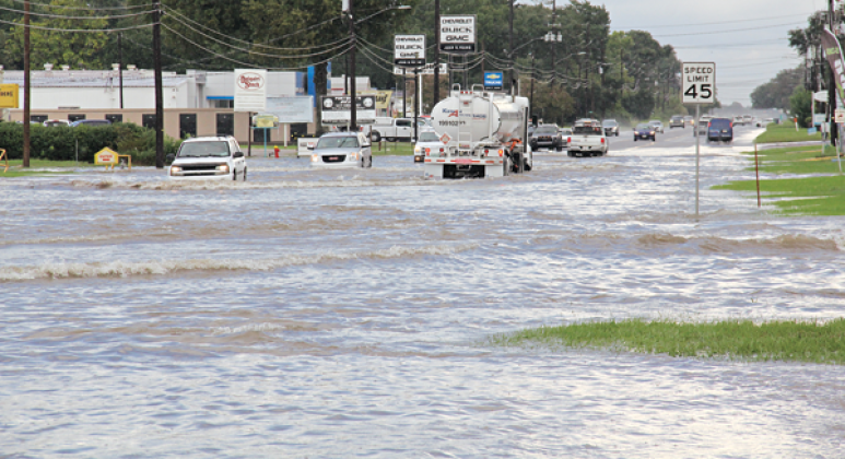 Flooding rains occurred at about 5 p.m. Tuesday in Eunice. U.S. 190 is shown flooded by the Amy Shopping Center, which is a normal placing for flooding when heavy rains occur.