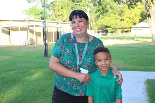 Kim Gaspard, a special education teacher at Eunice Elementary, welcomes Torie “TJ” Arclese.