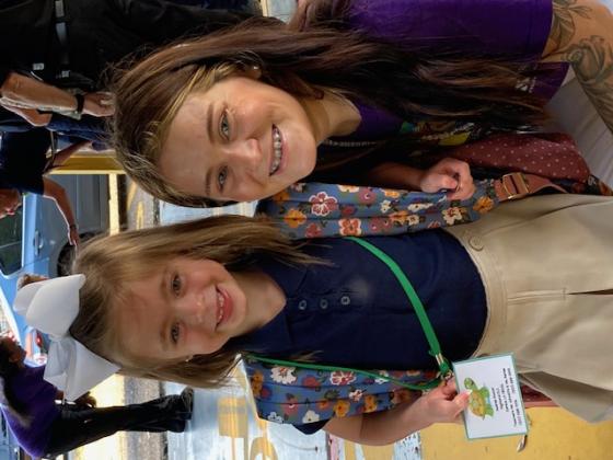 Meghan Briscoe, a Highland teacher, welcomes Audree Doucet on her first day of school Tuesday.