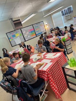 Abby Chapman’s third grade class at St. Edmund experienced a Boom Tasting.