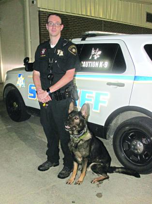 Acadia Parish Sheriff’s Deputy Hunter Richard and his K9 Deputy Django are one of the sheriff office’s two deputy-canine teams. Django is trained in narcotics detection and apprehension. (Photo by Claudette Olivier/Church Point News)