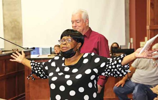 St. Landry Parish Registrar Cheryl Milburn and demographer Mike Hefner were among those who spoke at the St. Landry Parish Council meeting on Wednesday. (Photo by Harlan Kirgan)