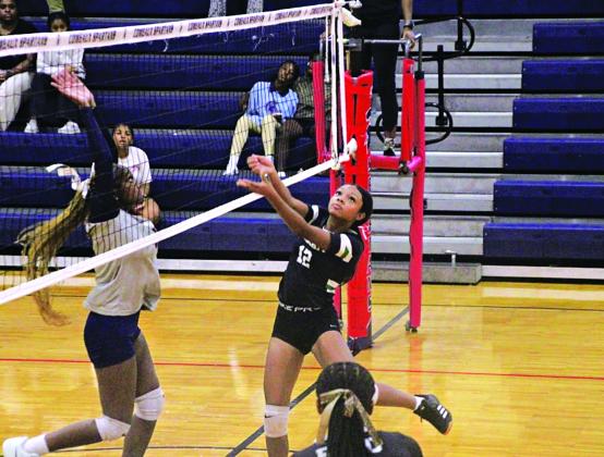 Junior Vivian Fontenot during a scrimmage with Comeaux High of Lafayette. (Photo by Rhett Manuel)