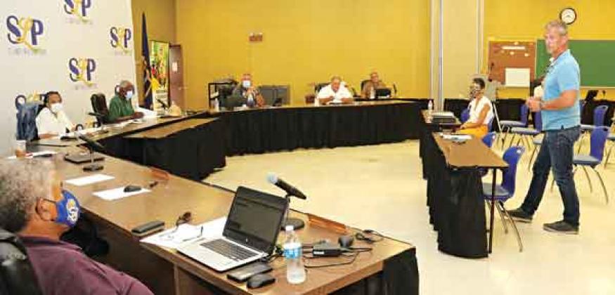 Lyn Henley, standing at right, a representative from Volkert Inc., speaks to St. Landry Parish School Board members on Monday during a meeting to decide on a master plan for a building program. (Photo by Harlan Kirgan)