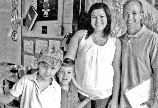 Jennifer Fontenot, a second grade teacher at Glendale Elementary, welcomed her parents and students to the school’s Open House last week. She also welcomed her entire family, left, Jackson, a second grader; Braylin, a kindergarten student; and her husband Jake.