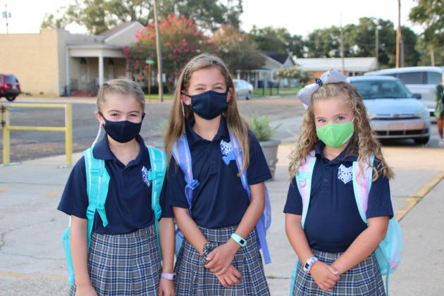 From left, are Mary Katherine McGee, third grader; Zoie Habetz, fourth grader; and Lillian Habetz, first grader.