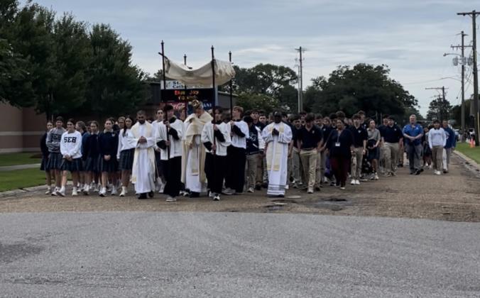 St. Edmund’s first All School Mass was held on Aug. 23 followed by their annual Eucharistic Procession where the Blessed Sacrament is brought from the Church and placed inside the school chapel.