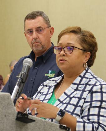 St. Landry Parish President Jessie Bellard, left, is offering two parish investigators to help the St. Landry Parish School District address truancy issues. Bellard is shown with Dwanetta Scott, supervisor of Child Welfare and Attendance, a School Board committee meeting on Tuesday. (Photo by Harlan Kirgan)