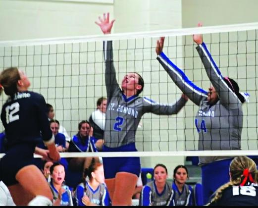 St. Edmund senior Caroline Lavergne sets the ball for a potential spike during Wednesday’s loss to Notre Dame. (Photo by Rhett Manuel)