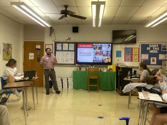 Sam Farmer, admissions counselor from UL Lafayette, presented a program for St. Edmund High seniors. He discussed topics of admissions; application process; scholarships; TOPS awards; FAFSA completion; majors, minors, and concentrations; study abroad; internships; job placement; research opportunities; transition from high school to college and the differences; how to be successful in college; campus events and activities; clubs and organizations; university recreation center; athletics and intramural sport