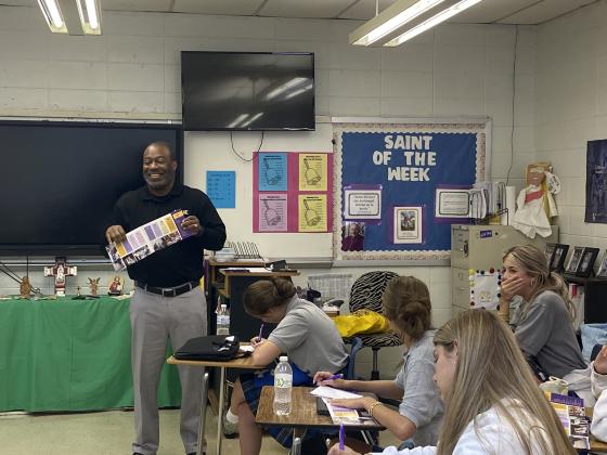 Chad Jones from LSUE speaks to St. Edmund seniors