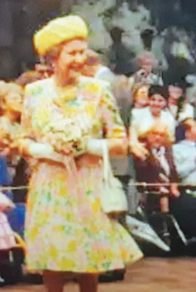 Queen Elizabeth II is shown during a parade in Tampa, Florida, with Eunice resident Donna Baltakis at right in the background. (Submitted photo)