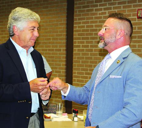 Jonathon “JP” Perry, a Louisiana 3rd Circuit Court of Appeal Judge, speaks with Jacque Pucheu after the meeting. (Photo by Myra Miller)