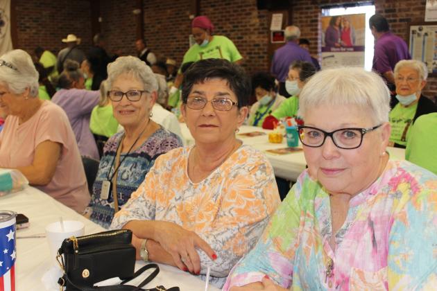 Friends sit together during the TRIAD workshop. From left are Glenda Bergeron, Janell Deshotel and Norma Diaville.  (Photo by Myra Miller)