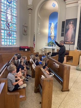 The Rev. Nick Ware gave Mayson Manuel’s Pre-K4 class at St. Edmund Elementary a tour of St. Anthony of Padua Catholic Church. Students  learned about the statues, altar, crucifix, and the tabernacle. (Submitted photo)