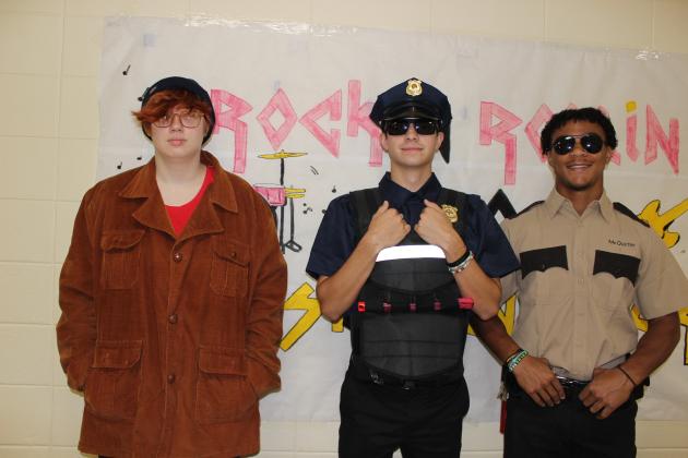 Eunice High students dressed Thursday as the first letter of their first name. From left, are Sophie Reed, a sophomore; Caleb David, and Jonathan McQuirter, both seniors.